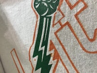 a shirt with an image of a fist on it